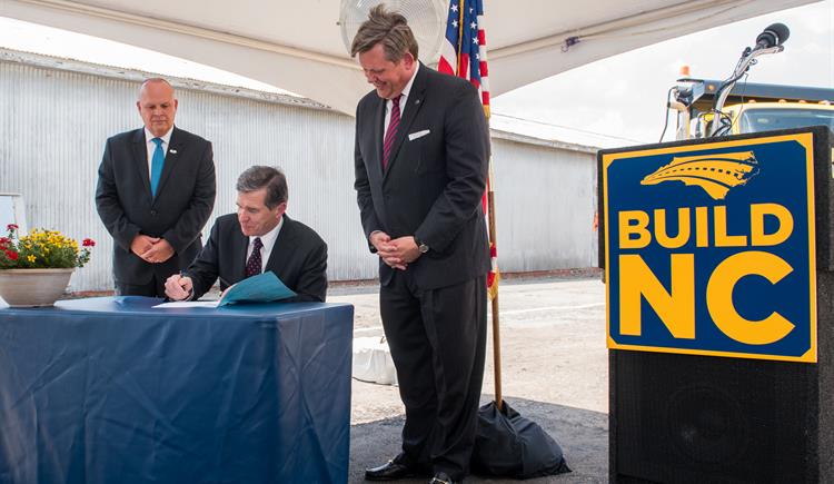 Gov. Cooper Signs Build NC Into Law