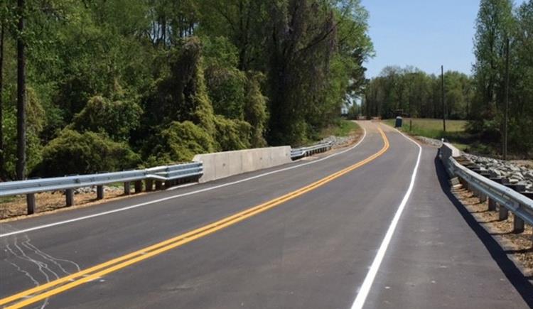 A new bridge with fresh pavement and lane striping was built on Zion Church Road in Wayne County