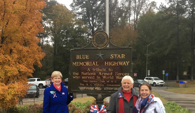 People stand in front of the new Blue Star Memorial Marker site in Nash County