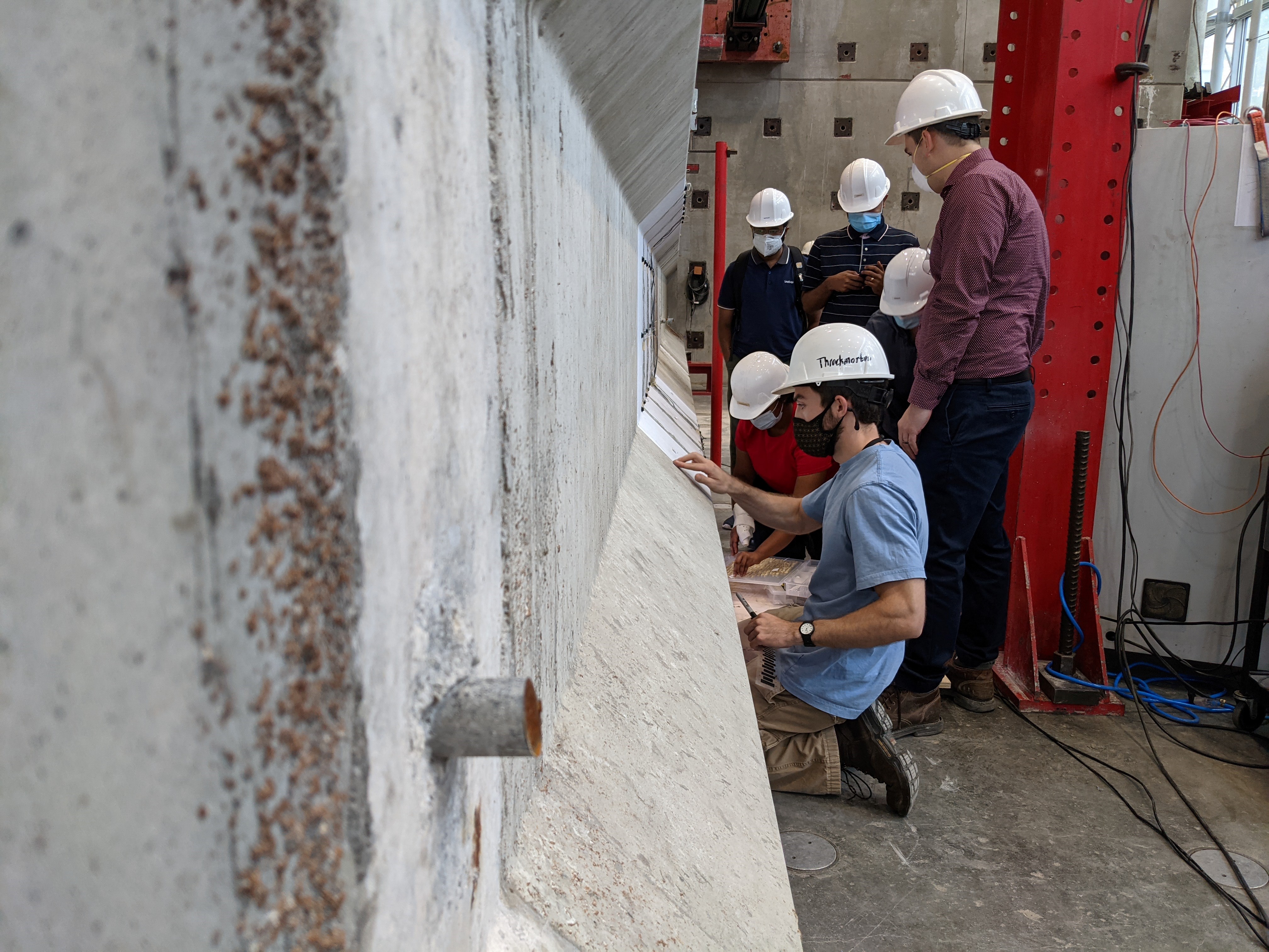 Researchers work on girder at N.C. State University.