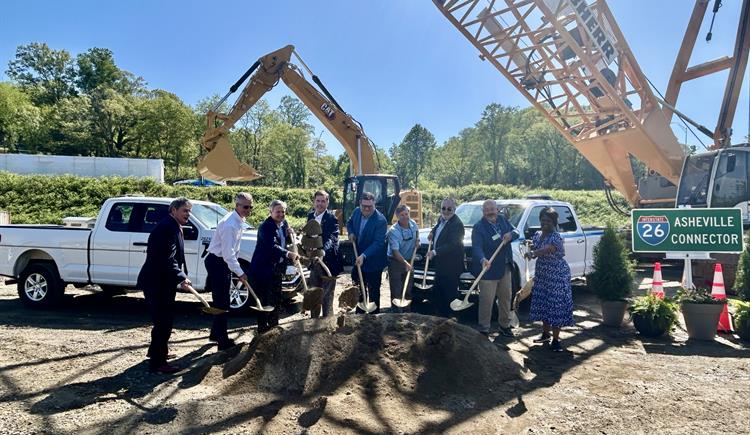 Officials break ground on the Asheville I-26 Connector. 