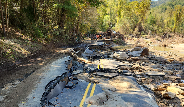 A catastrophically damaged road, Green River Cove, is shown.