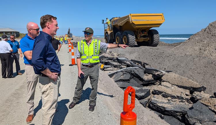 NCDOT Secretary Daniel Johnson surveys the damage on NC 12