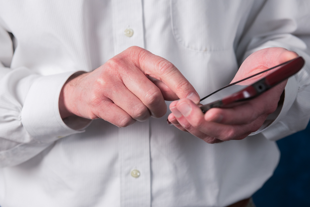 Man using the phone to contact the department